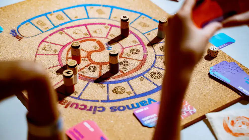 Group of players intently looking at a game board